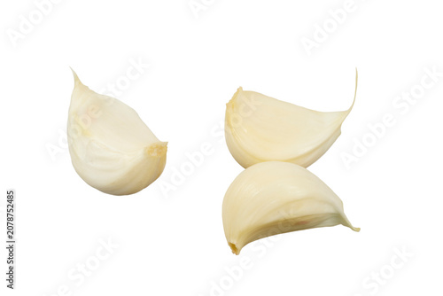 group of three garlic clove or cloves of garlic toes isolated on white or transparent png