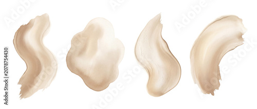 Four unique shapes of cream or lotion are present, displaying different textures. Each shape has a smooth surface and a light color. They rest on a clear background highlighting their forms