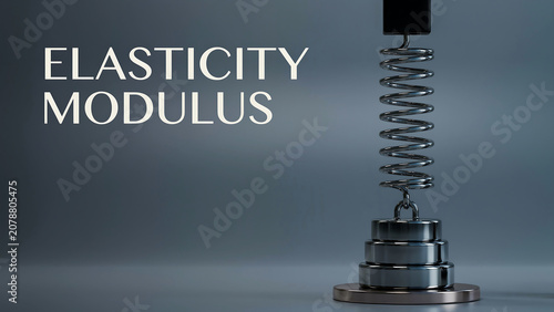 Elasticity modulus concept with metal spring and weights  scientific equipment for measuring elasticity  physics and engineering educational tool  laboratory setting with gray background