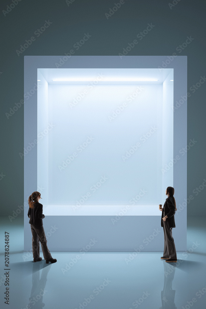 Fototapeta premium Two women stand before luminous digital portal in pale futuristic space with soft cool light, reflective floor, and centered composition. Fits digital interfaces, XR, and spatial technology campaigns.