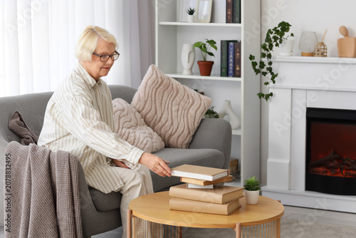 Senior woman in eyeglasses ...