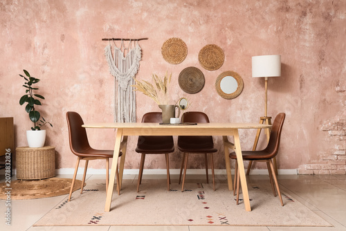 Принти на полотні Interior of stylish dining room with table and lamp