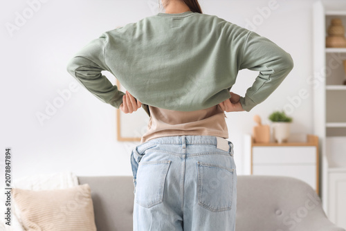 Young woman wearing clothes...