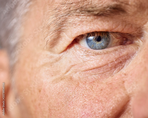 Blue eye of mature man