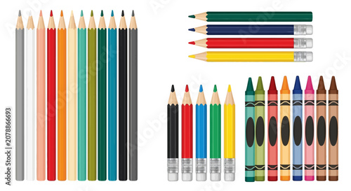 Colorful pencils and markers arranged on a table indoors