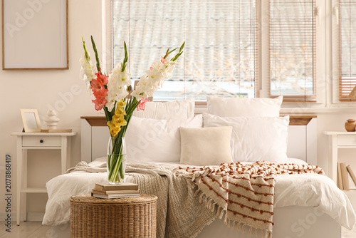 Books and vase with beautif...