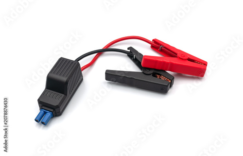 Car jump starter cables with a protection unit on a white background