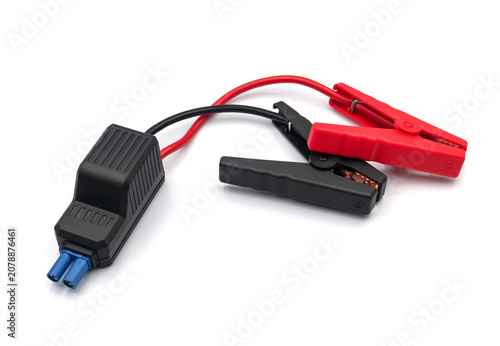 Car jump starter cables with a protection unit on a white background