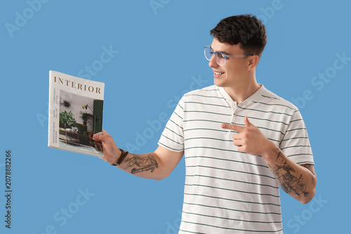 Handsome young man pointing...