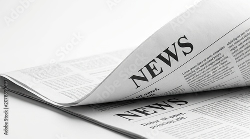 Newspaper headline NEWS open pages with text on white background