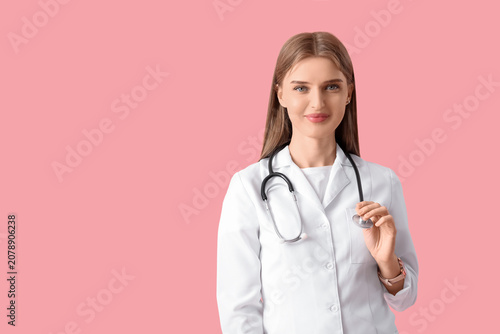 Beautiful young doctor on p...