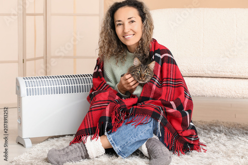 Happy mature woman in plaid...