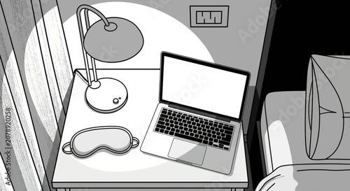 Foto Laptop and lamp on nightstand beside a bed in monochrome style