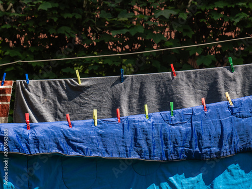 colorful clothesline on a sunny day. laundry is drying in the open air