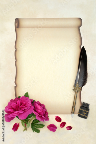 Writing a romantic old fashioned love letter to a lover on faded paper scroll on parchment, quill pen, ink bottle  with red rose flowers. Rosa rugosa. Copy space.