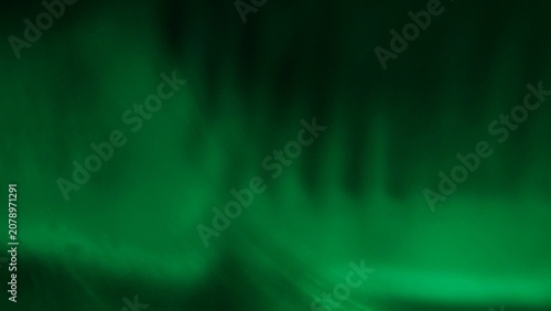 Abstract Green Background with Smooth Waves and Gradient Lighting