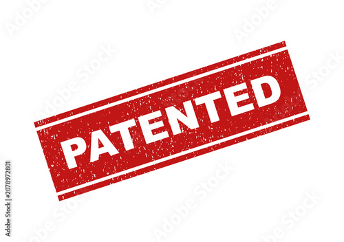 Red patented rubber stamp seal on a document paper texture