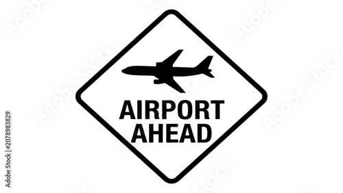 Photos Airport ahead sign directs travelers toward the terminal for their upcoming flight departures
