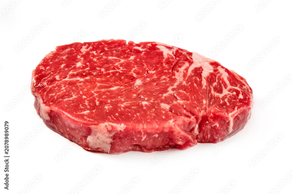 Obraz premium Raw ribeye steak isolated on white background