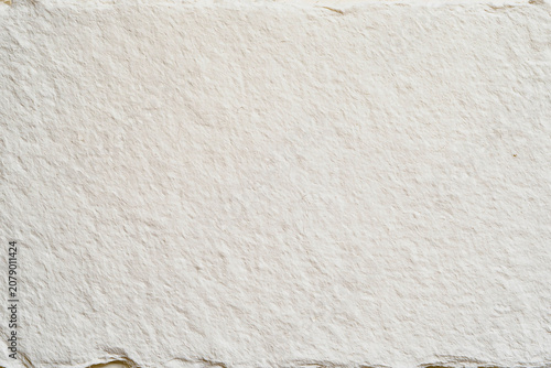 Premium white artisanal handmade paper sheet texture background