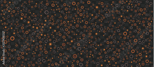 Fotografie A mesmerizing display of numerous orange and gray circles varying in size scattered across a dark background creating a captivating visual effect