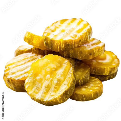 Stack of glossy dill pickle slices closeup isolated on white background