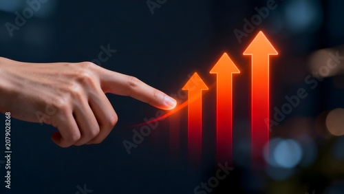 Hand pointing at rising arrow chart
