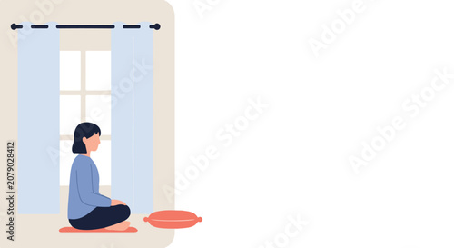 Fotografie A woman with short dark hair sits in a cross-legged meditative pose on a small mat near a window with white curtains in a minimalist room