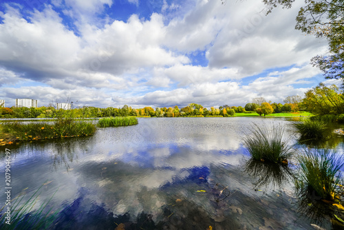 View of Vogelstangsee near Mannheim and the surrounding green landscape. Nature by the lake.

