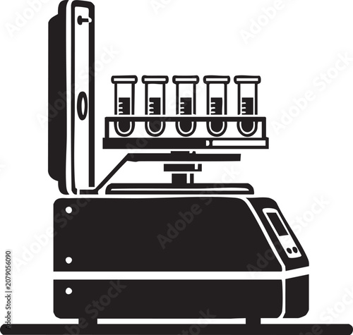 A laboratory device holds test tubes in a science setting indoors.