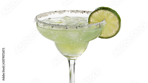 Classic glass margarita cocktail drink with lime slice isolated on a transparent background