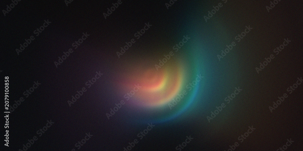 Fototapeta premium Abstract blurred colorful light flare on dark background.