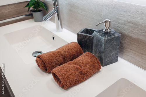 Clean towels in modern bathroom 