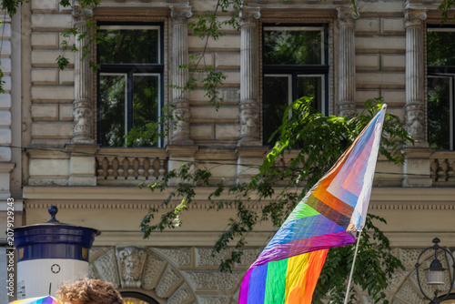 Cuadro en lienzo rainbow pride flag on a city street