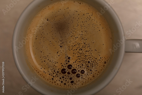 Εκτύπωση καμβά A warm and inviting top down view of freshly brewed coffee with foamy crema