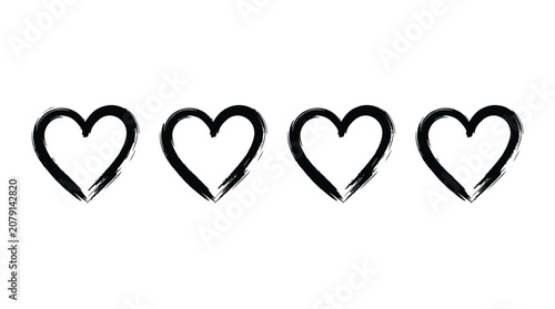 Four artistic hand-drawn heart shapes created with black ink brush strokes