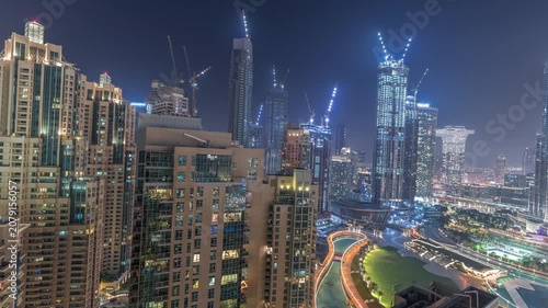 Downtown Dubai panorama high angle night timelapse filmed across Dubai. The extreme vertical density of the urban center is highlighted by artificial lighting. Unique design.
