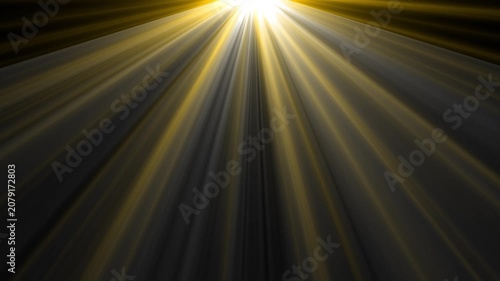 Seamless looping warm golden sunbeams dancing through ambient dust particles on a dark background creating a beautiful dramatic cinematic volumetric light ray overlay element.