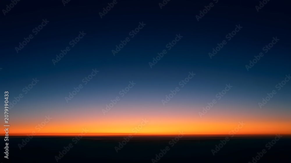 Obraz premium A serene gradient horizon captured under a dusky glow creating a tranquil and inviting ambient atmosphere