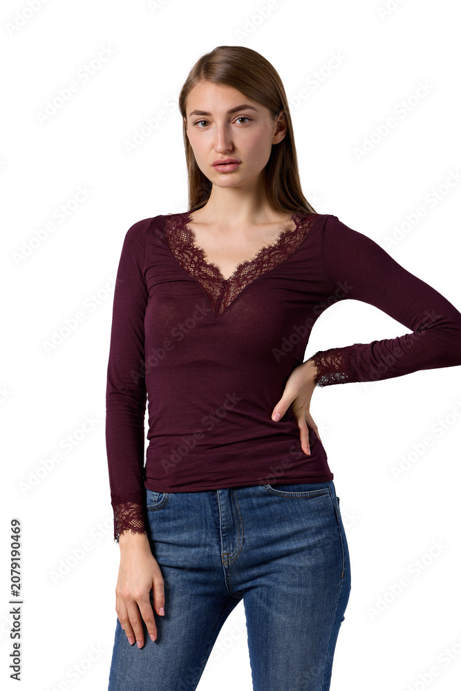 Obraz premium Slavic woman in burgundy lace top and jeans