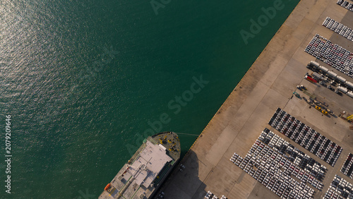 Aerial view from a container drone. Container ships in export-import and logistics business Transporting goods to large ports Worldwide shipping and logistics business International business abroad