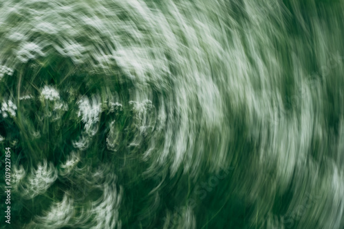 Green abstract background with blurred motion
