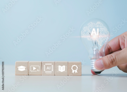 Wooden blocks with light bulbs, artificial intelligence (AI) learning, educational tools, video-based instruction, digital courses, online lessons, e-learning concepts.