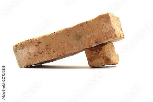 Foto Traditional bricks on a white background for wall construction.