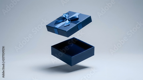 Floating blue gift box with ribbon lid detached above base floating surprise celebration