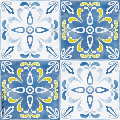 Decorative ceramic tiles showcase intricate floral designs in blue, white, and yellow, arranged in a symmetrical pattern suitable for various interior applications