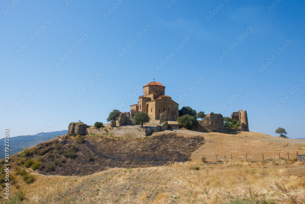 Fototapeta premium Panoramic photo of Georgia old monastery. Orthodox church in mountain