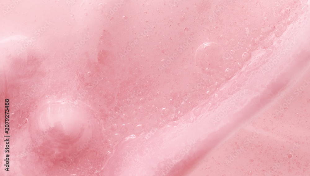Fototapeta premium Soft pink liquid texture background featuring a smooth tactile finish and copy space
