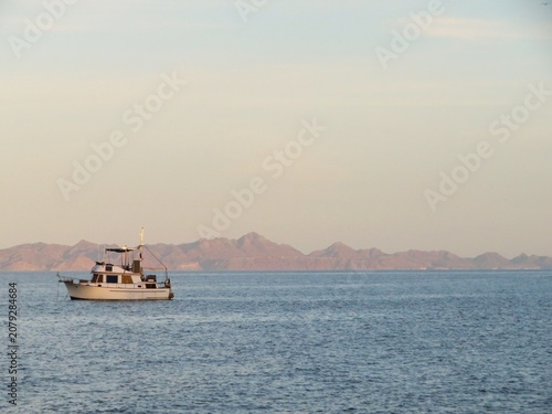 sailboat at sunset at sea in Baja California Sur, Mexico