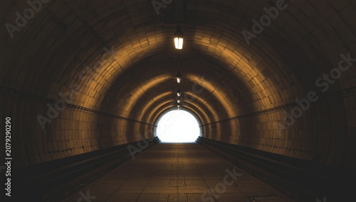 Tunnel leading to bright light at the end